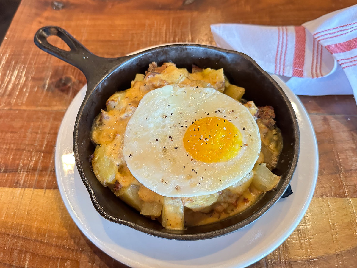 home style skillet hashbrowns with egg on top